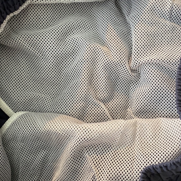 A Lacoste men’s quick-dry swim shorts with built in mesh lining. - Picture 5 of 8